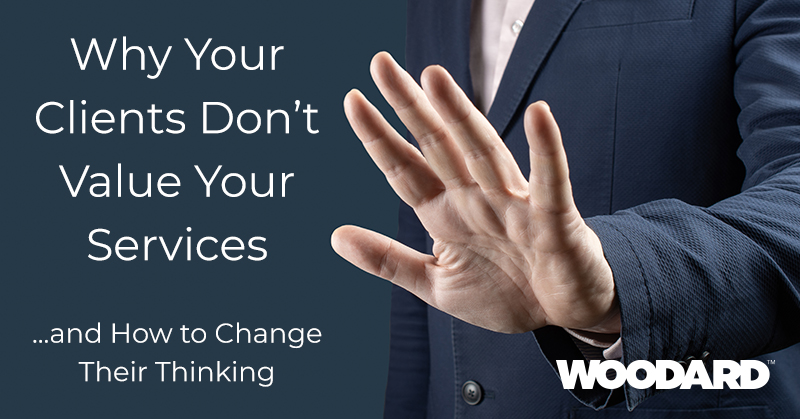 A deep, dark blue with a person's torso wearing a suit. The persons hand is out and indicating 'stop' with white text in the forground that says 'why your clients dont value your services and how to change their thinking' 